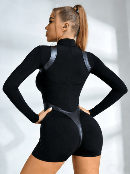 Luxeraum.de One-Pieces Damen Kunstleder Jumpsuit ZASUWA – Push Up Lederlook Catsuit mit Reißverschluss & Stehkragen
